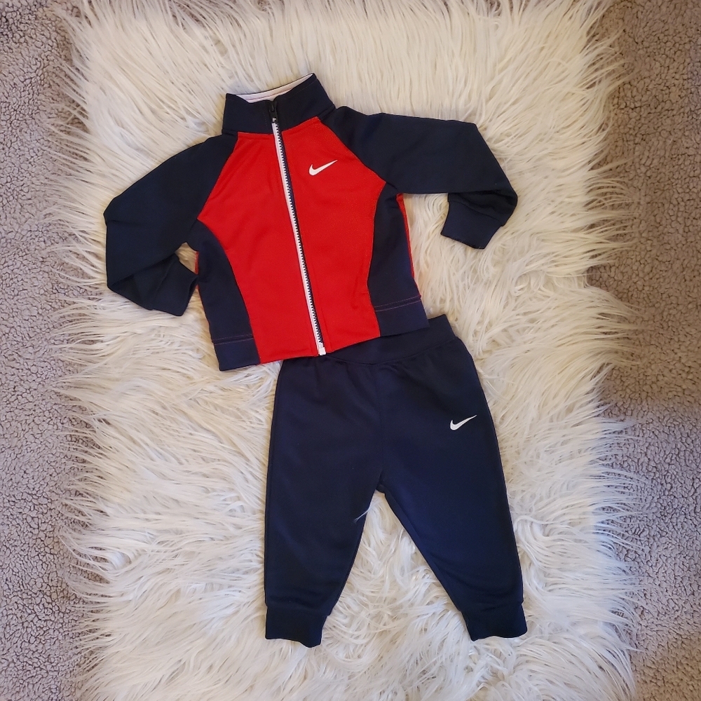Navy blue and red track suit